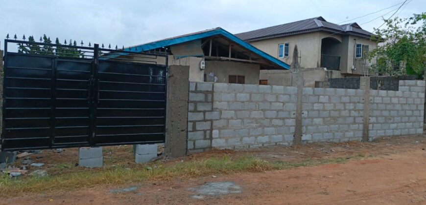Fully Fenced and Gated Plot of Land with Tenement Bungalow
