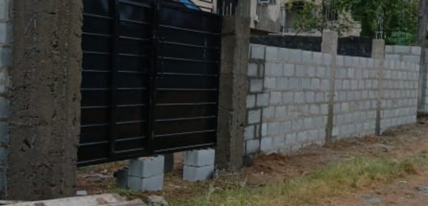 Fully Fenced and Gated Plot of Land with Tenement Bungalow