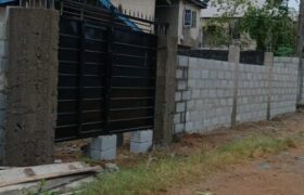 Fully Fenced and Gated Plot of Land with Tenement Bungalow