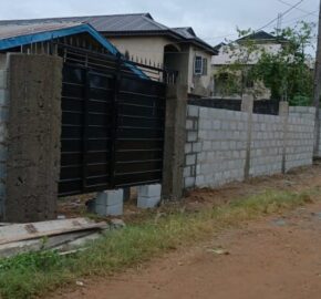 Fully Fenced and Gated Plot of Land with Tenement Bungalow