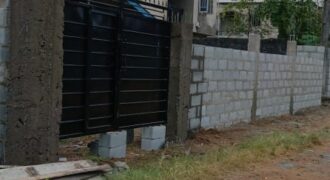 Fully Fenced and Gated Plot of Land with Tenement Bungalow