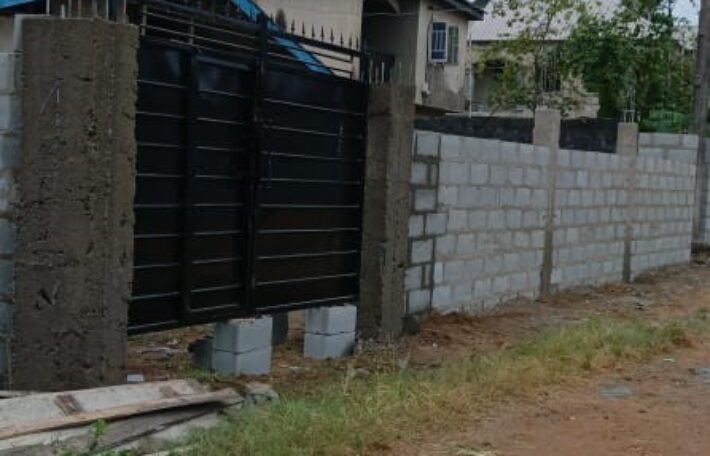 Fully Fenced and Gated Plot of Land with Tenement Bungalow